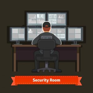 Cybersecurity analyst at a surveillance desk, monitoring multiple live threat feeds in a dark SOC room.