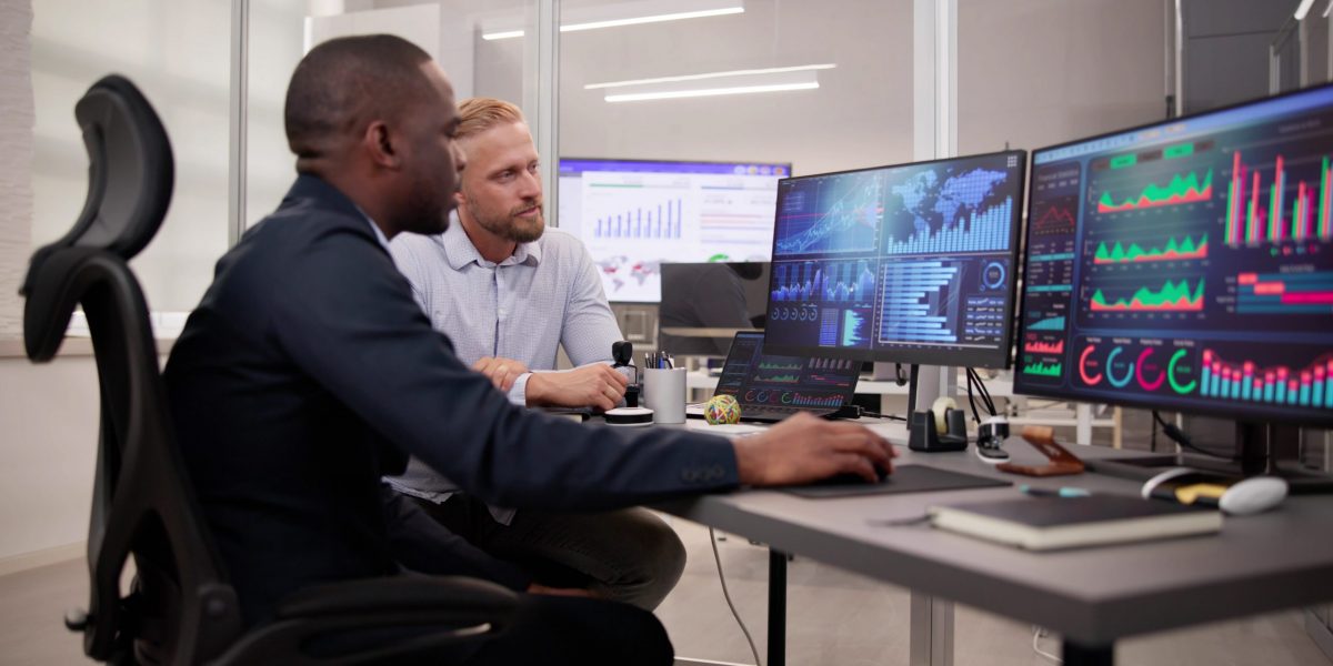 African American Data Analyst Using Data Analytics KPI Dashboard