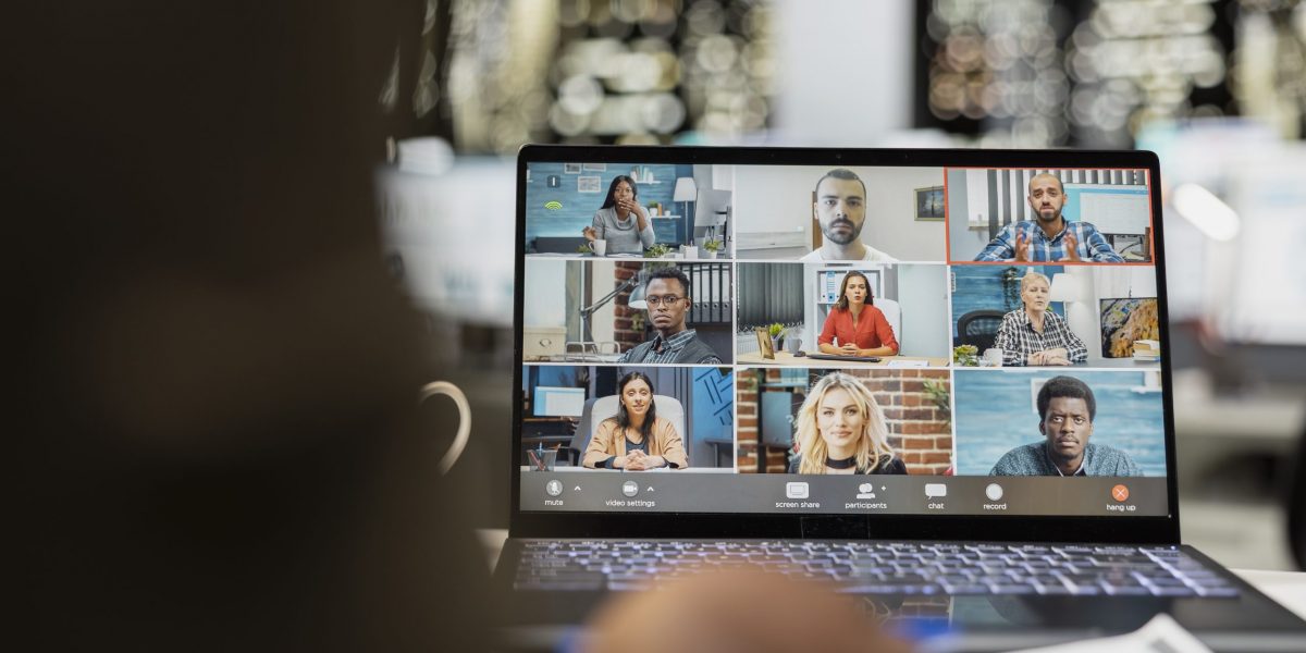 Black professional chatting on online video conference with shareholders, review the financial reports in order to expand the company activity. Web meeting at night due to different time zones.